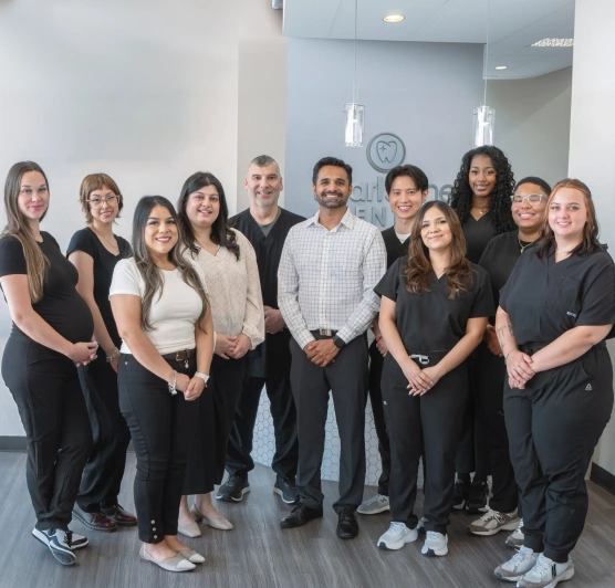 Dental team standing together in the dental office