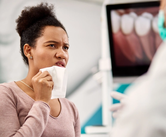 Woman receiving cold sore treatment