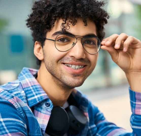 Patient wearing traditional metal braces